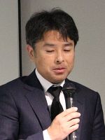 新国 哲也 氏